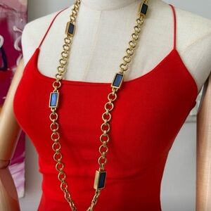 Vintage Yves Saint Laurent 18k gold plated necklace with blue charms

18”